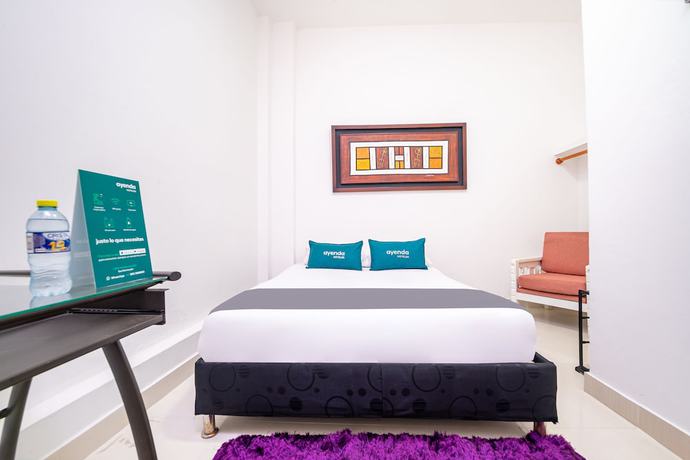 Imagen de la habitación del Hotel Centenario Boutique. Foto 15