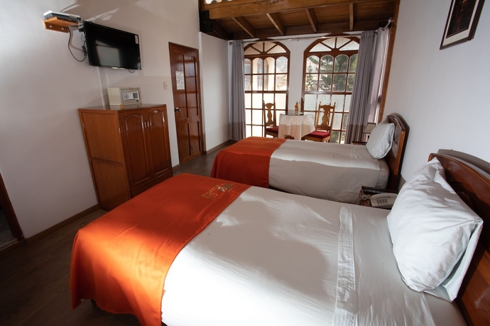 Imagen de la habitación del Hotel Centenario Inn. Foto 2