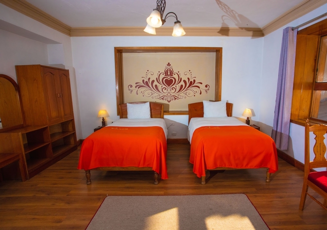 Imagen de la habitación del Hotel Centenario Inn. Foto 12