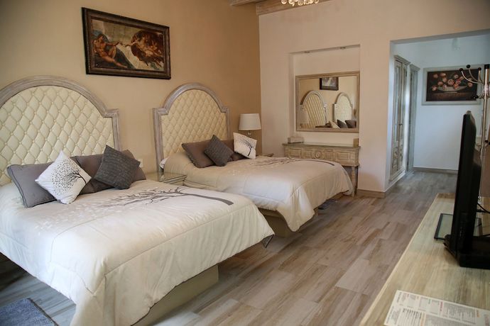 Imagen de la habitación del Hotel Centenario Los Arroyitos. Foto 8