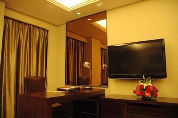 Imagen de la habitación del Hotel Centenio Kingdom. Foto 8
