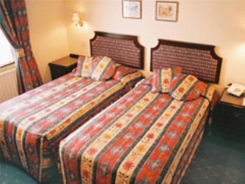 Imagen de la habitación del Hotel Centennial. Foto 8