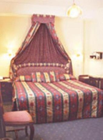 Imagen de la habitación del Hotel Centennial. Foto 10