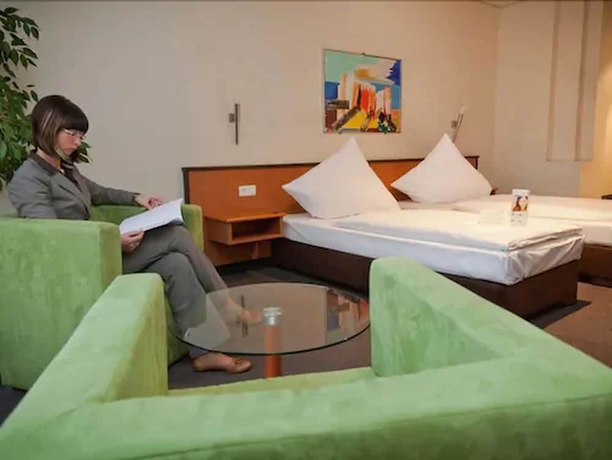 Imagen de la habitación del Hotel Center Alte Spinnerei. Foto 11