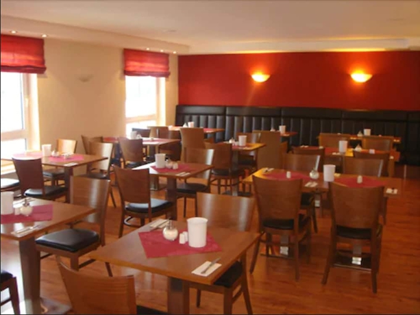 Imagen del bar/restaurante del Hotel Center Drive Inn. Foto 4