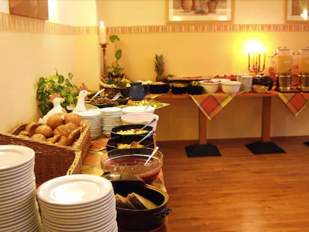 Imagen del bar/restaurante del Hotel Center Drive Inn. Foto 5