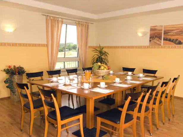 Imagen de los interiores del Hotel Center Drive Inn. Foto 15