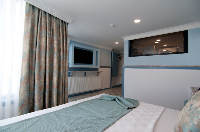 Imagen de la habitación del Hotel Center Hill. Foto 16