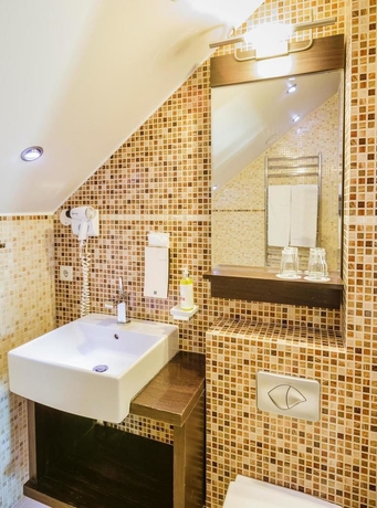 Imagen de la habitación del Hotel Center Hotels Plaza. Foto 2