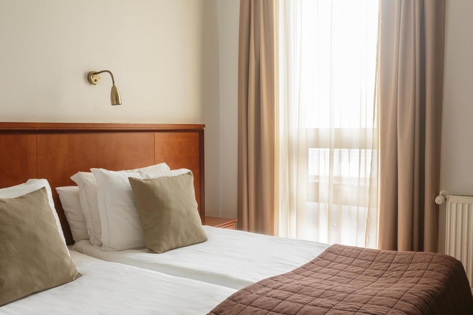 Imagen de la habitación del Hotel Center Hotels Plaza. Foto 5