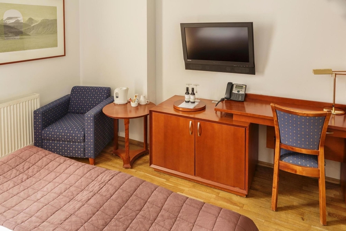 Imagen de la habitación del Hotel Center Hotels Plaza. Foto 9