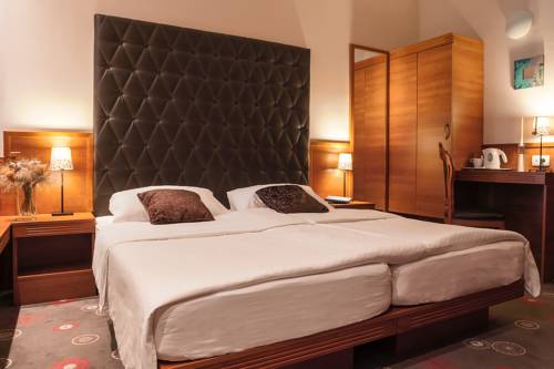 Imagen de la habitación del Hotel Center Ljubljana. Foto 2