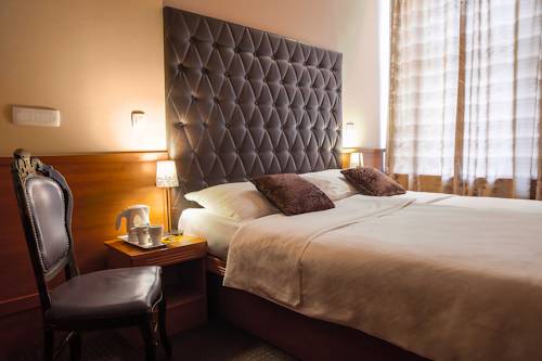 Imagen de la habitación del Hotel Center Ljubljana. Foto 9