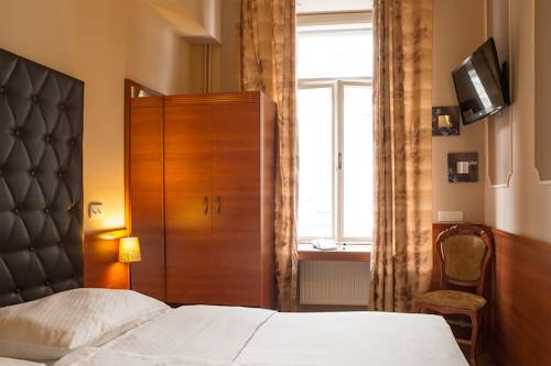 Imagen de la habitación del Hotel Center Ljubljana. Foto 11