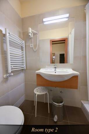 Imagen de la habitación del Hotel Center Ljubljana. Foto 15