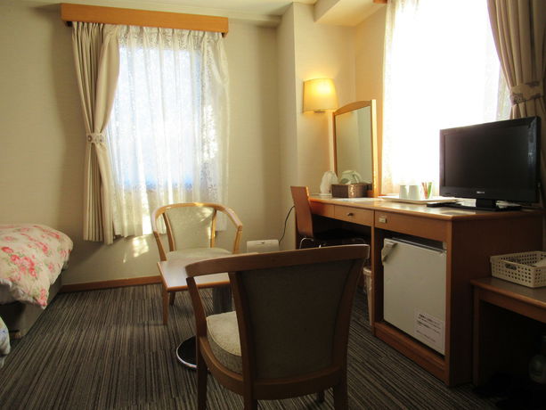 Imagen de la habitación del Hotel Center Mihara. Foto 16