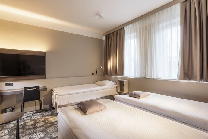 Imagen de la habitación del Hotel Center, Novo Mesto. Foto 2