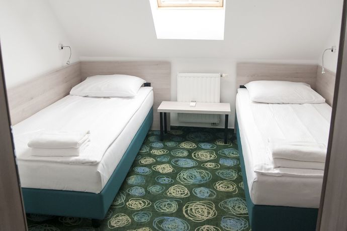 Imagen de la habitación del Hotel Center, Novo Mesto. Foto 6