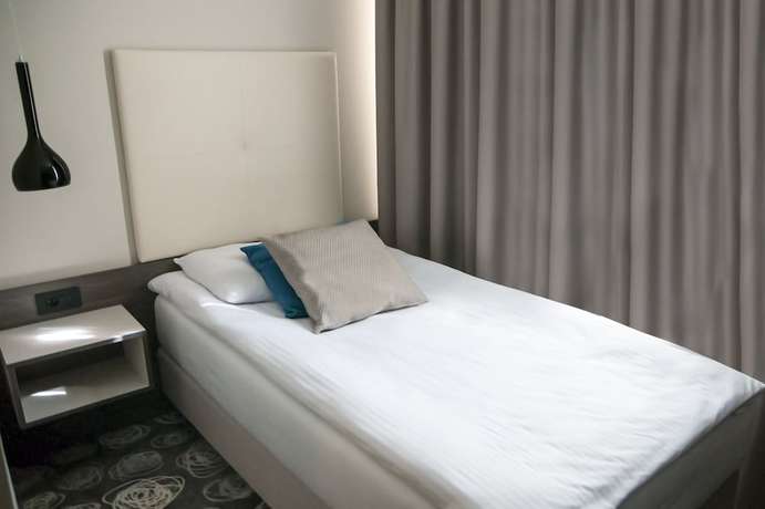 Imagen de la habitación del Hotel Center, Novo Mesto. Foto 10