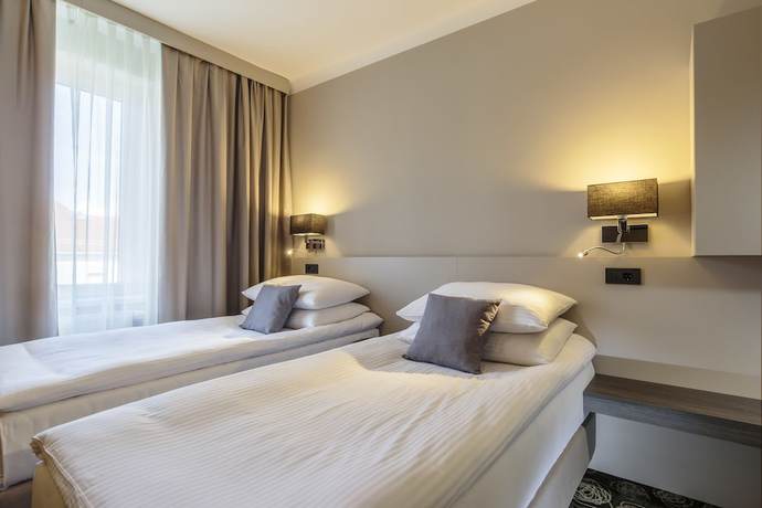 Imagen de la habitación del Hotel Center, Novo Mesto. Foto 11