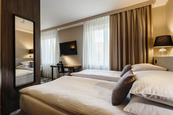 Imagen de la habitación del Hotel Center, Novo Mesto. Foto 12