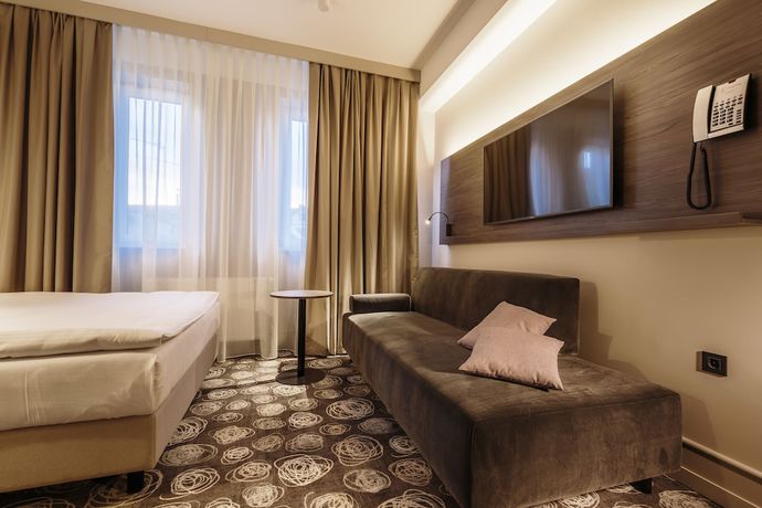 Imagen de la habitación del Hotel Center, Novo Mesto. Foto 14