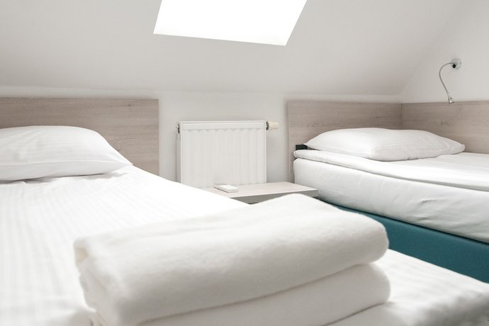 Imagen de la habitación del Hotel Center, Novo Mesto. Foto 15