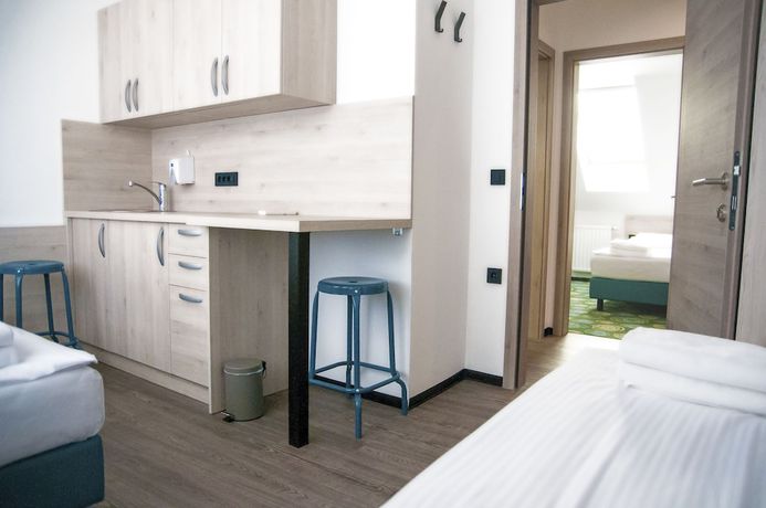Imagen de la habitación del Hotel Center, Novo Mesto. Foto 18