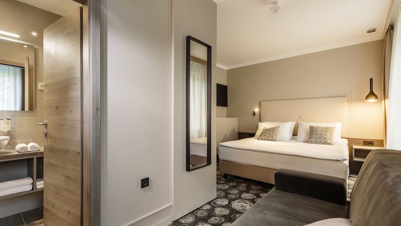 Imagen de la habitación del Hotel Center, Novo Mesto. Foto 19