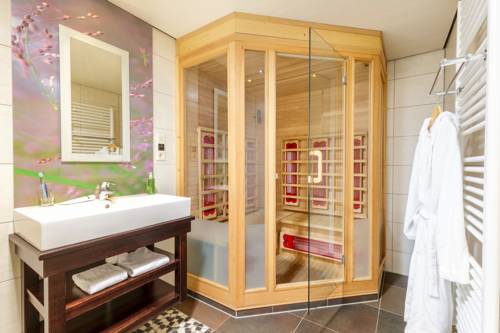 Imagen de la habitación del Hotel Center Parcs De Huttenheugte. Foto 8