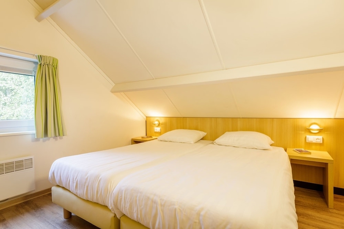 Imagen de la habitación del Hotel Center Parcs Les Ardennes. Foto 19