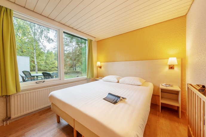 Imagen de la habitación del Hotel Center Parcs Les Bois-Francs. Foto 13