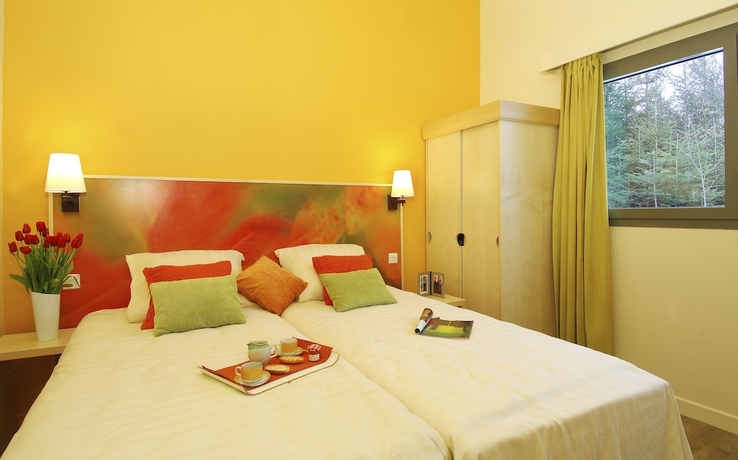 Imagen de la habitación del Hotel Center Parcs Les Trois For&ecirc;ts. Foto 3