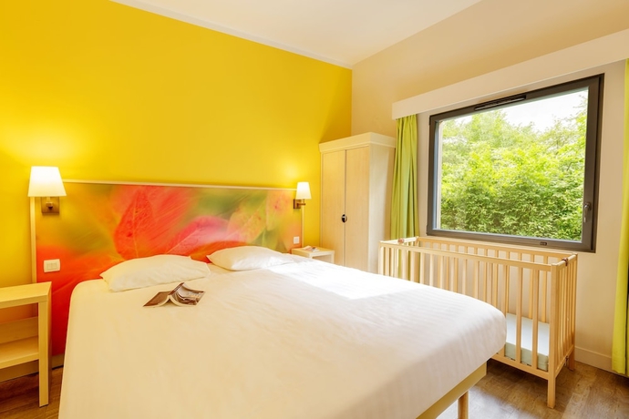 Imagen de la habitación del Hotel Center Parcs Les Trois For&ecirc;ts. Foto 15