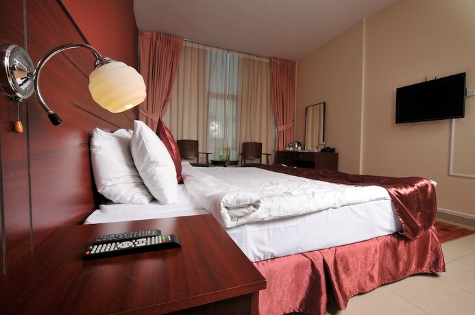 Imagen de la habitación del Hotel Center Ville. Foto 19