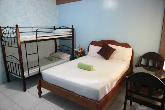 Imagen de la habitación del Hotel Centillo Travellers Inn. Foto 15
