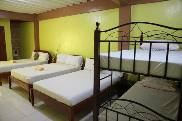 Imagen de la habitación del Hotel Centillo Travellers Inn. Foto 16