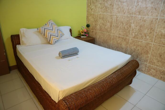 Imagen de la habitación del Hotel Centillo Travellers Inn. Foto 20