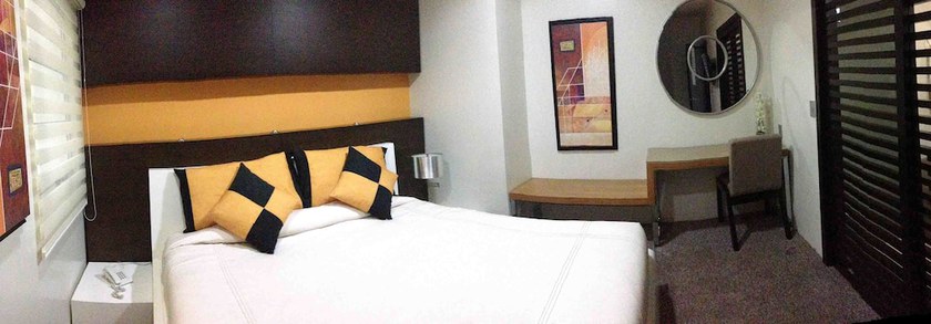 Imagen de la habitación del Hotel Centinela Grand. Foto 14