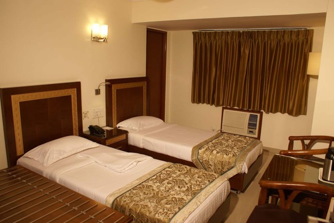 Imagen de la habitación del Hotel Centra, Ahmedabad. Foto 5