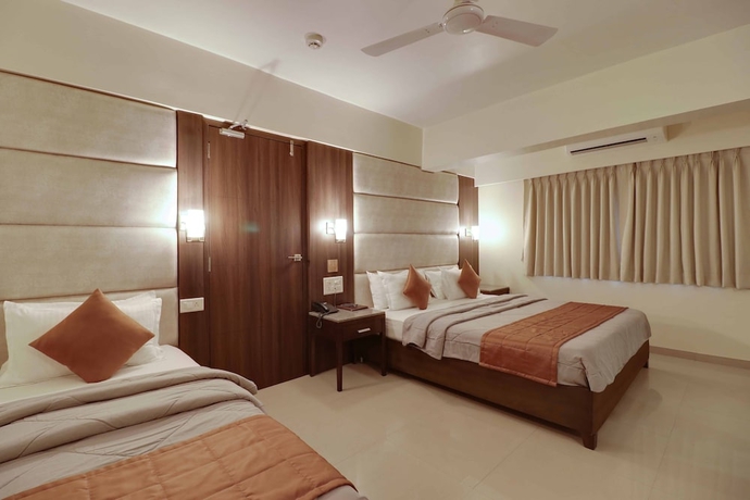 Imagen de la habitación del Hotel Centra, Ahmedabad. Foto 4
