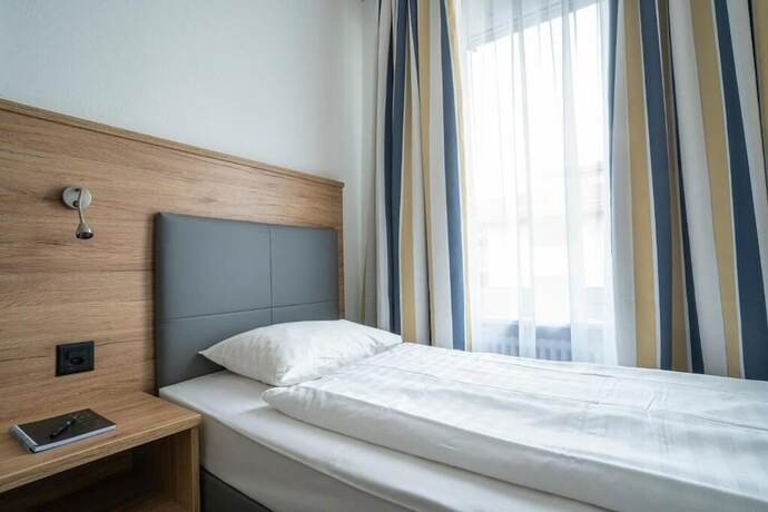 Imagen de la habitación del Hotel Centra Winterthur. Foto 18