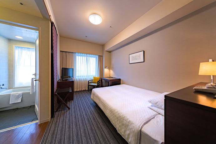 Imagen de la habitación del Hotel Centrair. Foto 12