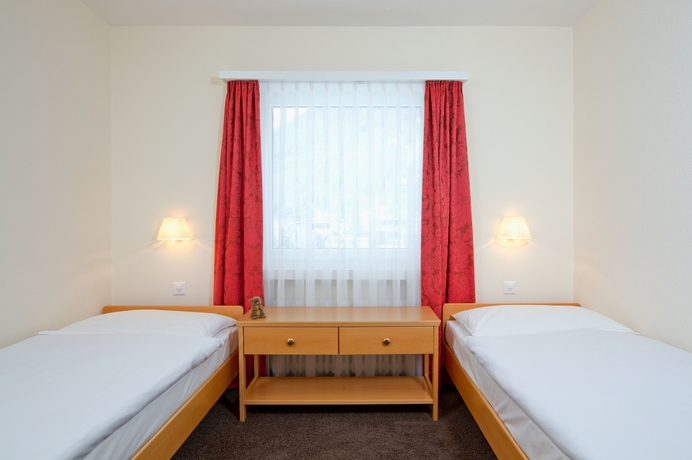 Imagen de la habitación del Hotel Central Apartments Davos. Foto 9