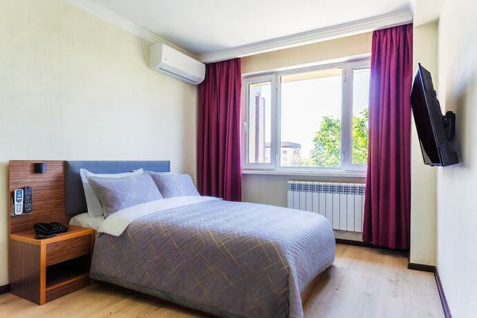 Imagen de la habitación del Hotel Central Asia. Foto 15