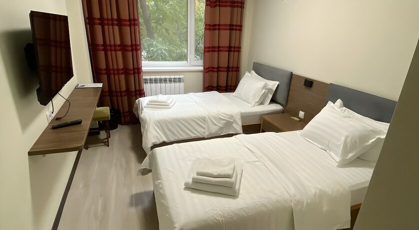 Imagen de la habitación del Hotel Central Asia. Foto 18