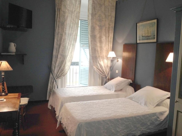 Imagen de la habitación del Hotel Central Bastia. Foto 11