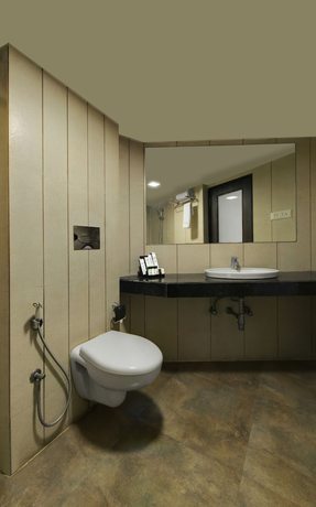 Imagen de la habitación del Hotel Central Beacon Surat. Foto 4