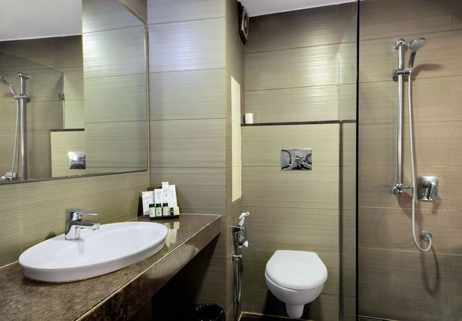 Imagen de la habitación del Hotel Central Beacon Surat. Foto 11