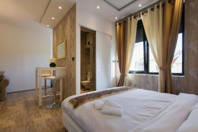 Imagen de la habitación del Hotel Central Business Apartment. Foto 18
